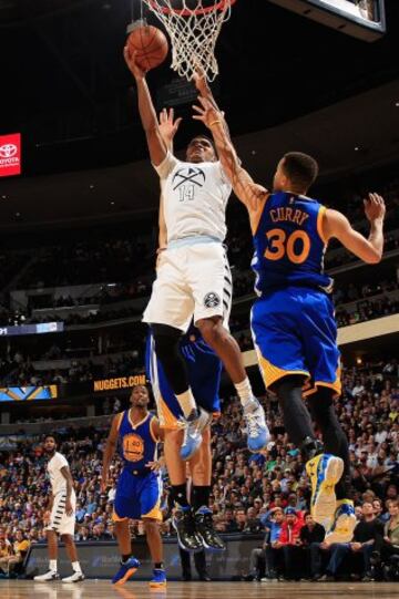 Gary Harris y Stephen Curry.