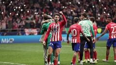 Atletico Madrid's Spanish defender #22 Mario Hermoso and teammates celebrate victory at the end of the UEFA Champions League last 16 second leg football match between Club Atletico de Madrid and Inter Milan at the Metropolitano stadium in Madrid on March 13, 2024. (Photo by Thomas COEX / AFP)