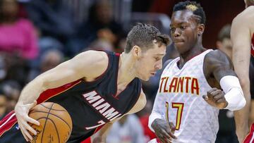 ELX022. ATLANTA (EE.UU.), 07/12/2016.- El esloveno Goran Dragic (i) de Miami Heat avanza con el balón frente al alemán Dennis Schroeder (d) de Atlanta Hawks hoy, miércoles 7 de noviembre de 2016, durante un juego de la NBA realizado en Philips Arena en Atlanta (EE.UU.). EFE/ERIK S. LESSER