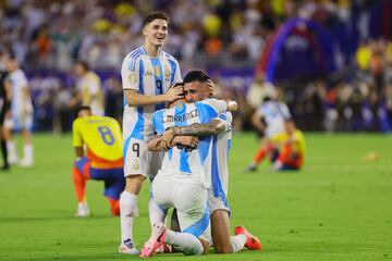 Jul 14, 2024; Miami, FL, USA; Argentina forward Julian Alvarez (9), forward Nicolas Gonzalez (15) and forward Lautaro Martinez (22) celebrate during the Copa America final against Colombia at Hard Rock Stadium. Mandatory Credit: Sam Navarro-USA TODAY Sports