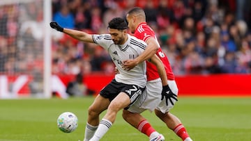 Soccer Football - Premier League - Nottingham Forest v Fulham - The City Ground, Nottingham, Britain - March 15, 2026 Fulham's Raul Jimenez in action with Nottingham Forest's Murillo Action Images via Reuters/Andrew Couldridge EDITORIAL USE ONLY. NO USE WITH UNAUTHORIZED AUDIO, VIDEO, DATA, FIXTURE LISTS, CLUB/LEAGUE LOGOS OR 'LIVE' SERVICES. ONLINE IN-MATCH USE LIMITED TO 120 IMAGES, NO VIDEO EMULATION. NO USE IN BETTING, GAMES OR SINGLE CLUB/LEAGUE/PLAYER PUBLICATIONS. PLEASE CONTACT YOUR ACCOUNT REPRESENTATIVE FOR FURTHER DETAILS..