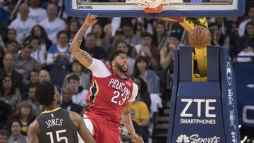 April 7, 2018; Oakland, CA, USA; New Orleans Pelicans forward Anthony Davis (23) dunks the basketball against Golden State Warriors center Damian Jones (15) during the third quarter at Oracle Arena. The Pelicans defeated the Warriors 126-120. Mandatory Cr