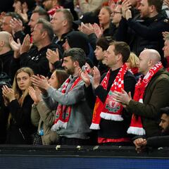 Fans stand with Cristiano, home fans sing YNWA on 7 minutes at Anfield