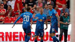 Leipzig's Slovenian forward #30 Benjamin Sesko (R) celebrates scoring the 3-0 goal with team mates Leipzig's Spanish forward #07 Dani Olmo (C) and Leipzig's Dutch midfielder #20 Xavi Simons during the German first division Bundesliga football match between 1 FC Union Berlin and RB Leipzig in Berlin on September 3, 2023. (Photo by Odd ANDERSEN / AFP) / DFL REGULATIONS PROHIBIT ANY USE OF PHOTOGRAPHS AS IMAGE SEQUENCES AND/OR QUASI-VIDEO