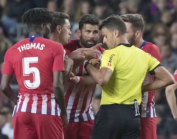 "Who, me?" Costa stating his case to Gil Manzano.