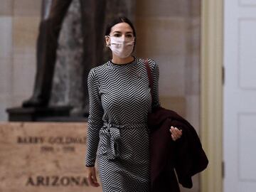 US Representative Alexandria Ocasio-Cortez (D-NY) walks to the House floor on Capitol Hill March 10, 2021, in Washington, DC.