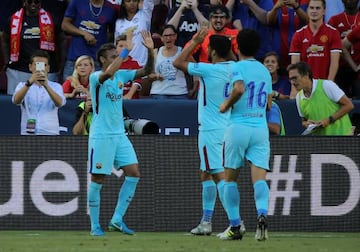 Barcelona's Neymar celebrates scoring their first goal with team mates