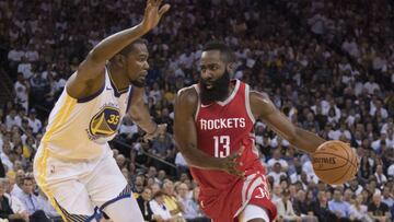 October 17, 2017; Oakland, CA, USA; Houston Rockets guard James Harden (13) dribbles the basketball against Golden State Warriors forward Kevin Durant (35) during the first quarter at Oracle Arena. Mandatory Credit: Kyle Terada-USA TODAY Sports