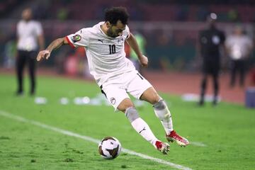 Egypt's forward Mohamed Salah controls the ball during the Africa Cup of Nations (CAN) 2021 semi-final football match between Cameroon and Egypt at Stade d'Olembe in Yaounde on February 3, 2022. (Photo by Kenzo Tribouillard / AFP)