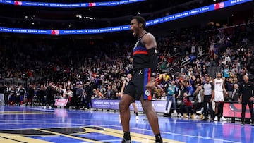 Jalen Duren #0 of the Detroit Pistons reacts to a dunk late in double overtime while playing the Miami Heat in the first round of the Emirates NBA Cup at Little Caesars Arena on November 12, 2024 in Detroit, Michigan.