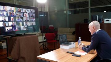 Las Rozas (Spain), 25/03/2020.- A handout photo made available by the Royal Spanish Soccer Federation (RFEF) shows the federation&#039;s president, Luis Rubiales (R), during a video-conference meeting with the heads of regional soccer federations in Las R