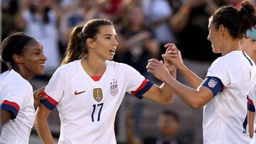 PASADENA, CALIFORNIA - AUGUST 03: Tobin Heath #17 of the United States celebrates her goal with Crystal Dunn #19 and Carli Lloyd #10, to take a 1-0 lead over The Republic of Ireland during the first half of the first game of the USWNT Victory Tour at Rose