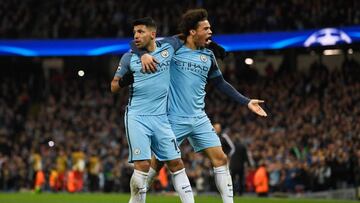 Sergio Aguero of Manchester City (L) celebrates with Leroy Sane