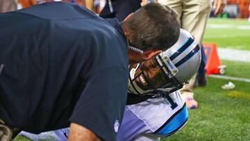 Sep 8, 2016; Denver, CO, USA; Carolina Panthers quarterback Cam Newton (1) reacts in pain on the sidelines after suffering an injury in the third quarter against the Denver Broncos at Sports Authority Field at Mile High. Mandatory Credit: Mark J. Rebilas-USA TODAY Sports