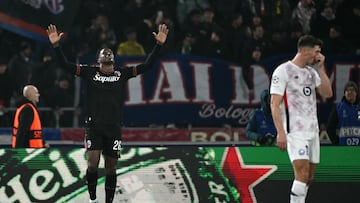 Bologna's Colombian defender #26 Jhon Lucumi celebrates scoring his team's first goal during the UEFA Champions League football match between Bologna and Lille at the Renato Dall'Ara stadium in Bologna on November 27, 2024. (Photo by Alberto PIZZOLI / AFP) (Photo by ALBERTO PIZZOLI/AFP via Getty Images)
