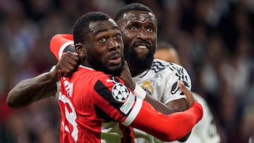 MADRID, SPAIN - NOVEMBER 5: Youssouf Fofana of Milan (C) fights for position with Antonio Rudiger of Real Madrid (R) during the UEFA Champions League 2024/25 League Phase MD4 match between Real Madrid C.F. and AC Milan at Estadio Santiago Bernabeu on November 5, 2024 in Madrid, Spain. (Photo by Alberto Gardin/Eurasia Sport Images/Getty Images)