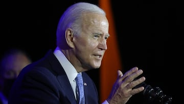 President Joe Biden speaks during a holiday celebration for the Democratic National Committee (DNC), at the Hotel Washington, in Washington.