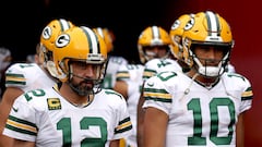 LANDOVER, MARYLAND - OCTOBER 23: Aaron Rodgers #12 of the Green Bay Packers and Jordan Love #10 take the field for warmups before the game against the Washington Commanders at FedExField on October 23, 2022 in Landover, Maryland.   Scott Taetsch/Getty Images/AFP