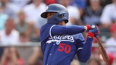 TEMPE, ARIZONA - FEBRUARY 24: Mookie Betts #50 of the Los Angeles Dodgers at bat during a spring training exhibition against the Los Angeles Angels at the Peoria Sports Complex on February 24, 2024 in Tempe, Arizona.   Steph Chambers/Getty Images/AFP (Photo by Steph Chambers / GETTY IMAGES NORTH AMERICA / Getty Images via AFP)