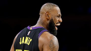 LOS ANGELES, CALIFORNIA - NOVEMBER 18: LeBron James #23 of the Los Angeles Lakers reacts against the Utah Jazz during the second quarter at Crypto.com Arena on November 18, 2025 in Los Angeles, California. NOTE TO USER: User expressly acknowledges and agrees that, by downloading and or using this photograph, User is consenting to the terms and conditions of the Getty Images License Agreement. Ronald Martinez/Getty Images/AFP (Photo by RONALD MARTINEZ / GETTY IMAGES NORTH AMERICA / Getty Images via AFP)