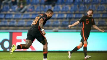 PODGORICA, MONTENEGRO - NOVEMBER 13: Memphis Depay of Netherlands celebrates after scoring first goal and penalty during the 2022 FIFA World Cup Qualifier match between Montenegro and Netherlands at Gradski Stadion on November 13, 2021 in Podgorica, Monte