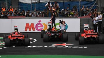 Red Bull&#039;s Dutch driver Max Verstappen celebrates after winning the F1 Mexico Grand Prix at the Hermanos Rodriguez circuit in Mexico City on October 28, 2018. - Mercedes&#039; British driver Lewis Hamilton became only the third Formula One driver in history to capture a fifth world title on Sunday as Max Verstappen won the Mexican Grand Prix. (Photo by Pedro PARDO / AFP)