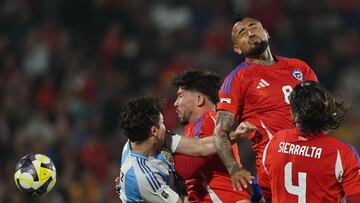 Chile's midfielder #08 Arturo Vidal (2nd R) heads the ball during the 2026 FIFA World Cup South American qualifiers football match between Chile and Argentina at the Nacional Julio Mart�nez Pradanos stadium in Santiago, on June 5, 2025. (Photo by Javier TORRES / AFP)