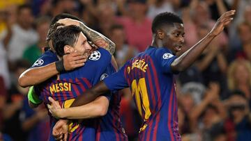 Barcelona's Argentinian forward Lionel Messi (L) celebrates with Barcelona's French forward Ousmane Dembele (L) and teammates during the UEFA Champions' League group B football match FC Barcelona against PSV Eindhoven at the Camp Nou stadiu