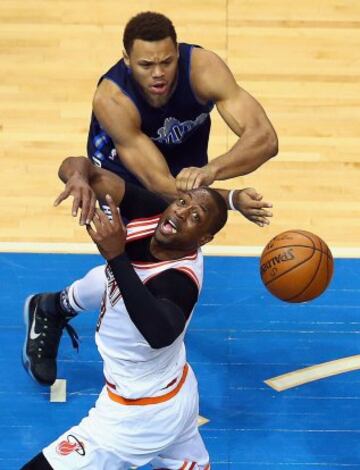 Dwyane Wade y Justin Anderson.