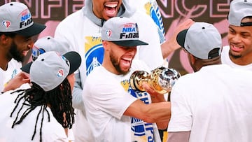 Steph Curry and the Golden State Warriors celebrate victory over the Mavericks in the Conference Finals.