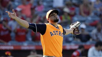Houston Astros relief pitcher Roberto Osuna celebrates after recording the last out of the baseball game against the Los Angeles Angels Sunday, Aug. 26, 2018, in Anaheim, Calif. Houston won 3-1. (AP Photo/Marcio Jose Sanchez)