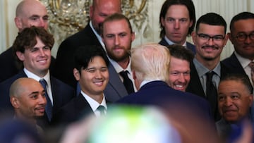 U.S. President Donald Trump speaks with Los Angeles Dodgers designated hitter Shohei Ohtani during a ceremony honoring the members of the 2024 World Series Champion Los Angeles Dodgers in the East Room at the White House in Washington, D.C., U.S., April 7, 2025. REUTERS/Leah Millis
