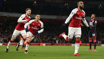 LONDON, ENGLAND - NOVEMBER 29: Alexandre Lacazette of Arsenal celebrates after scoring a goal to make it 1-0 during the Premier League match between Arsenal and Huddersfield Town at Emirates Stadium on November 28, 2017 in London, England. (Photo by Robbi