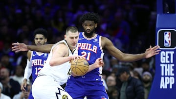 Nikola Jokic #15 of the Denver Nuggets is guarded by Joel Embiid #21 of the Philadelphia 76ers during the first quarter at the Wells Fargo Center on January 16, 2024 in Philadelphia, Pennsylvania.