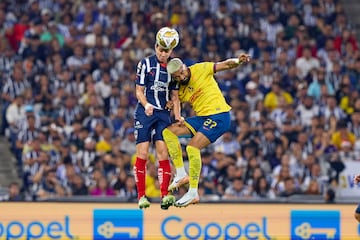  John Stefan Medina (L) of Monterrey fights for the ball with Rodrigo Aguirre (R) of America during the final second-leg match between Monterrey and America as part of the Torneo Apertura 2024 Liga MX at BBVA Bancomer Stadium, on December 15, 2024 in Monterrey, Nuevo Leon, Mexico.