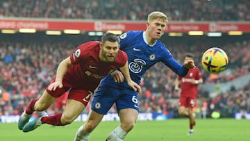 LIVERPOOL, ENGLAND - JANUARY 21: (THE SUN OUT. THE SUN ON SUNDAY OUT)  James Milner of Liverpool with Lewis Hall of Chelsea in action during the Premier League match between Liverpool FC and Chelsea FC at Anfield on January 21, 2023 in Liverpool, England. (Photo by John Powell/Liverpool FC via Getty Images)