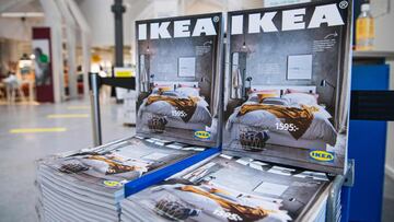 Catalogues are placed for people to take at the entrance to one of the stores of the Swedish furniture giant Ikea on December 7, 2020 in Jarfalla, near Stockholm. - Swedish furniture giant Ikea said Monday, December 7, 2020 it would stop printing its fame