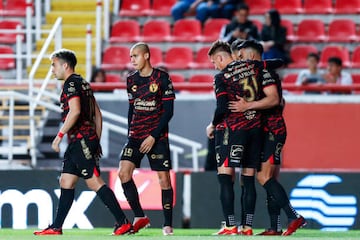 AGUASCALIENTES, MEXICO - FEBRUARY 03: Players of Tijuana celebrate the first goal of the team and own goal by Juan Pablo Segovia of Necaxa (not in frame) during the 5th round match between Necaxa and Tijuana as part of the Torneo Clausura 2023 Liga MX at Victoria Stadium on February 3, 2023 in Aguascalientes, Mexico. (Photo by Leopoldo Smith/Getty Images)