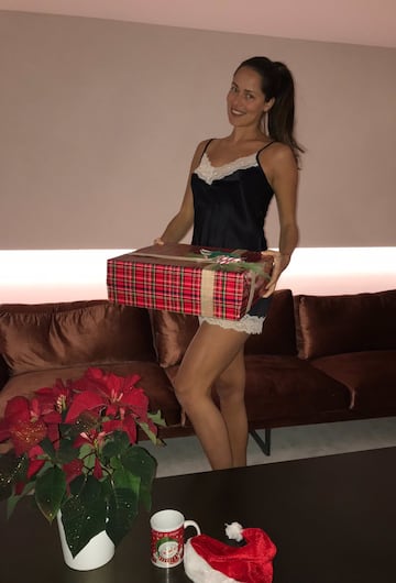 Ana Ivanovic poses with presents.