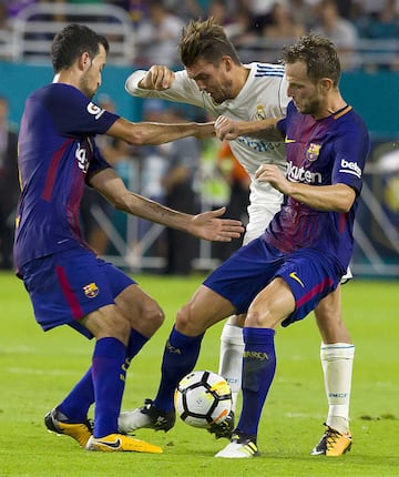 Kovacic, Rakitic and Busquets.