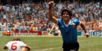 Maradona wheels away after his solo goal against England.