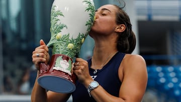 Caroline Garcia of France poses with the winner's trophy after beating Petra Kvitova of the Czech Republic in the final of the women's singles at the Lindner Family Tennis Center on August 21, 2022 in Mason, Ohio.