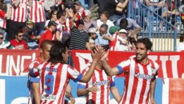 LANZADOS. Falcao, Miranda, Koke y Raúl García celebran un gol.