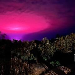 The city with a pink sky: but why?