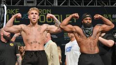 CLEVELAND, OHIO - AUGUST 28: Jake Paul and Tyron Woodley pose during the weigh in event at the State Theater prior to their August 29 fight on August 28, 2021 in Cleveland, Ohio.   Jason Miller/Getty Images/AFP
 == FOR NEWSPAPERS, INTERNET, TELCOS &amp; T