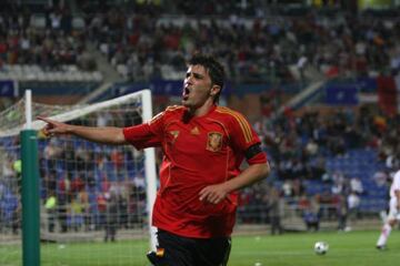 Villa celebra un gol durante su estapa en la Selección española.