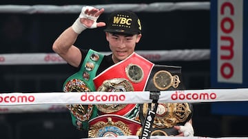 Japan's WBC and WBO super bantamweight champion Naoya Inoue celebrates his victory over Philippines' WBA and IBF super bantamweight champion Marlon Tapales after their four-belt world super bantamweight title unification match at Tokyo's Ariake Arena on December 26, 2023. (Photo by Kazuhiro NOGI / AFP)