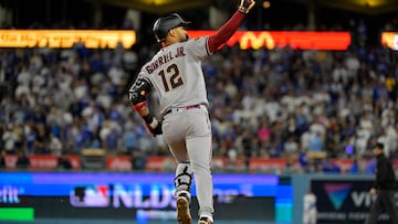 Oct 9, 2023; Los Angeles, California, USA; Arizona Diamondbacks left fielder Lourdes Gurriel Jr. (12) reacts after hitting a home run against the Los Angeles Dodgers during the sixth inning for game two of the NLDS for the 2023 MLB playoffs at Dodger Stadium. Mandatory Credit: Jayne Kamin-Oncea-USA TODAY Sports