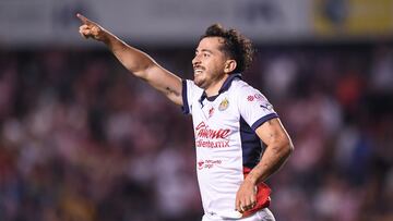Alan Mozo celebrates his goal 0-2 of Guadalajara during the 3rd round match between Queretaro and Guadalajara as part of the Liga BBVA MX, Torneo Apertura 2024 at La Corregidora Stadium on July 16, 2024 in Santiago de Queretaro, Mexico.