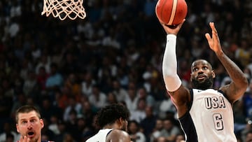 US forward #06 LeBron James shoots the ball during the Basketball Showcase friendly match between the United States and Serbia the at Etihad Arena in Abu Dhabi on July 17, 2024. (Photo by Giuseppe CACACE / AFP)